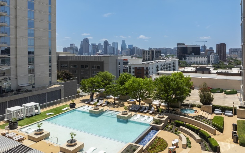 pool with nearness to property and ample shade from covering trees and with reclining seats