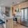 kitchen with an island, modern appliances and spacious counter-space