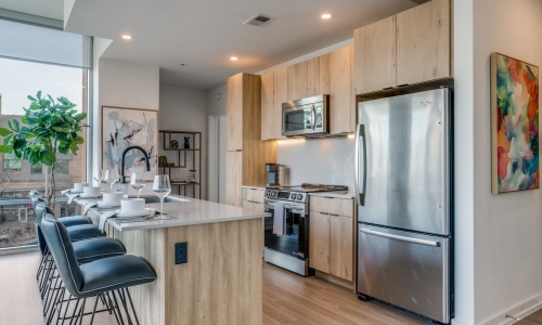 Feel at home with modern kitchen areas kitchen with an island, modern appliances and spacious counter-space