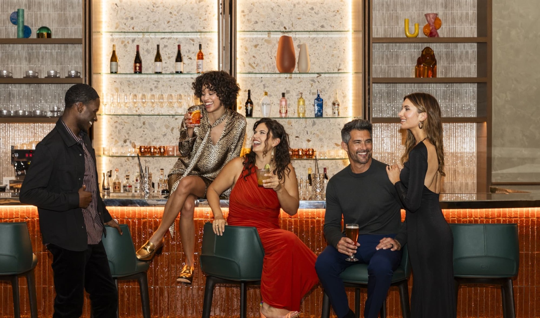 Experience Dallas From Here a group of friends at a bar