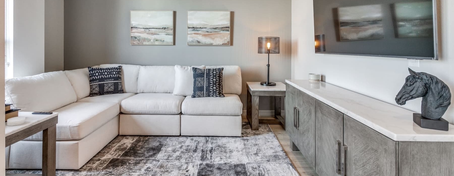 living area that includes ample seating spaces and bright lighting
