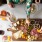 people sitting at a table with food