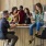 a group of people sitting around a table