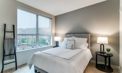 Designer Furnished Apartments bedroom with bright lighitng