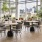 a room with tables and chairs