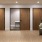 a room with a glass door and a wood floor